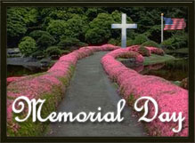 Memorial with cross and American flag